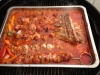 Spieße in Tomaten- Paprikasauce mit Knochen